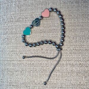 T & Co silver bracelet with pink and blue hearts adjustable length Tiffany